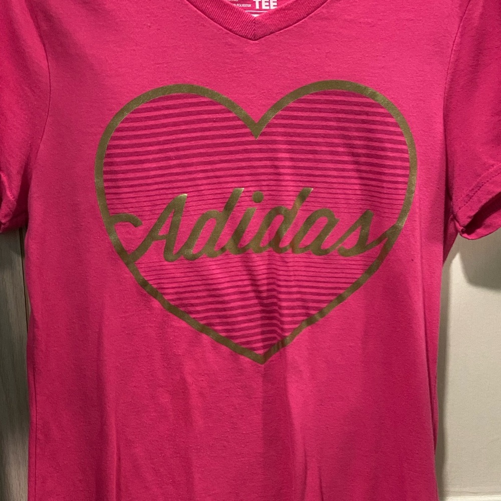 Pink Adidas short sleeved t-shirt. In size large (also sized as 14 in girls)